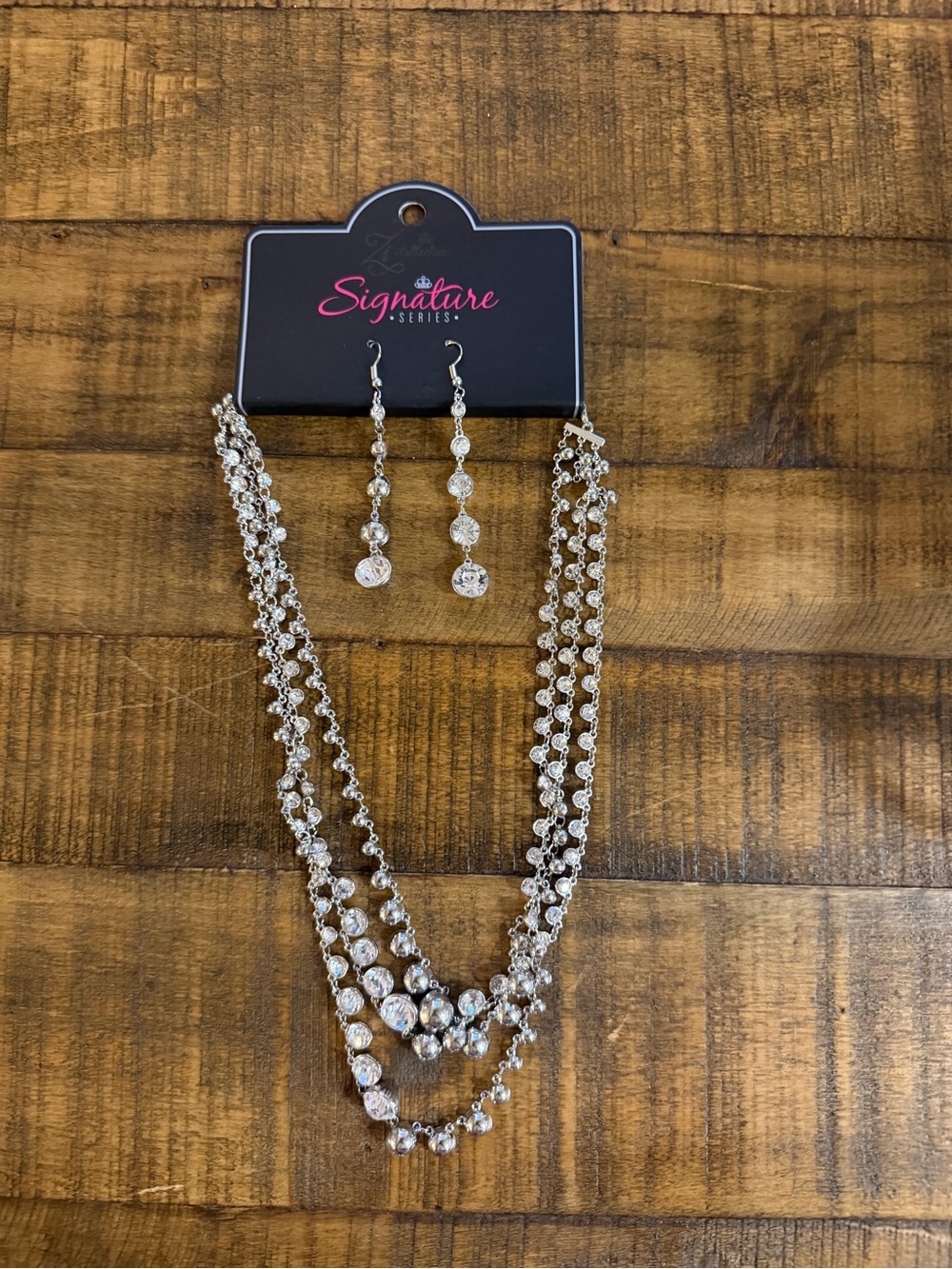 Paparazzi Silver Multi-Strand Crystal Necklace with Matching Drop Earrings.